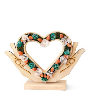 Corazón entre manos