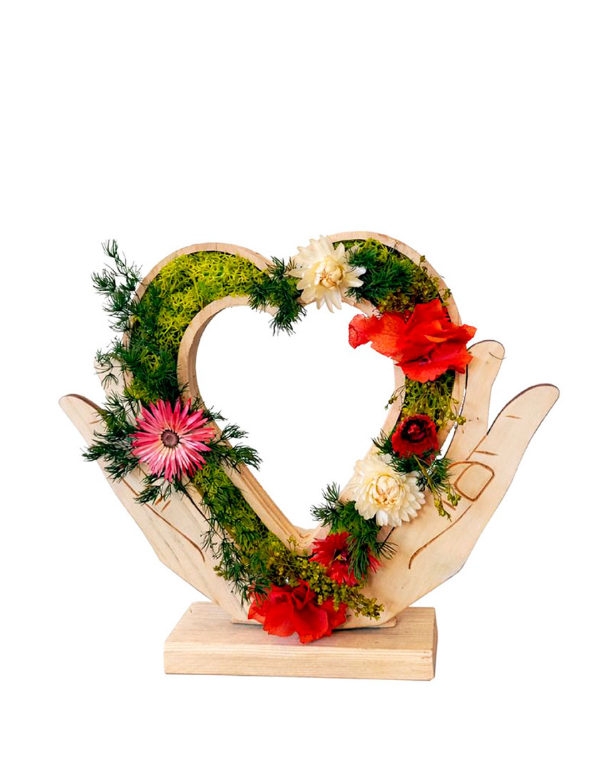 Corazón entre manos