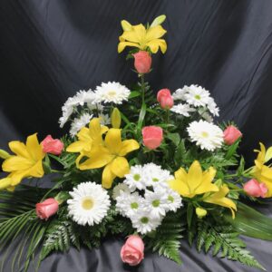 Centro funerario flores variadas
