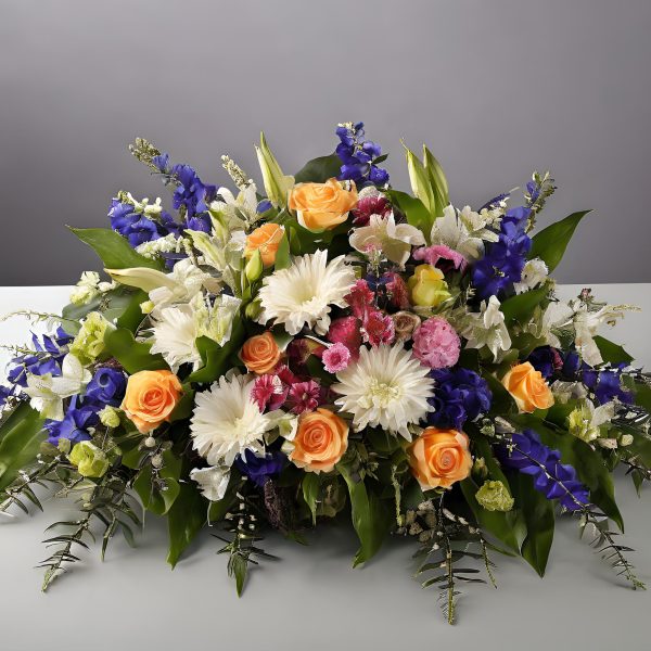 Centro funerario flores variadas